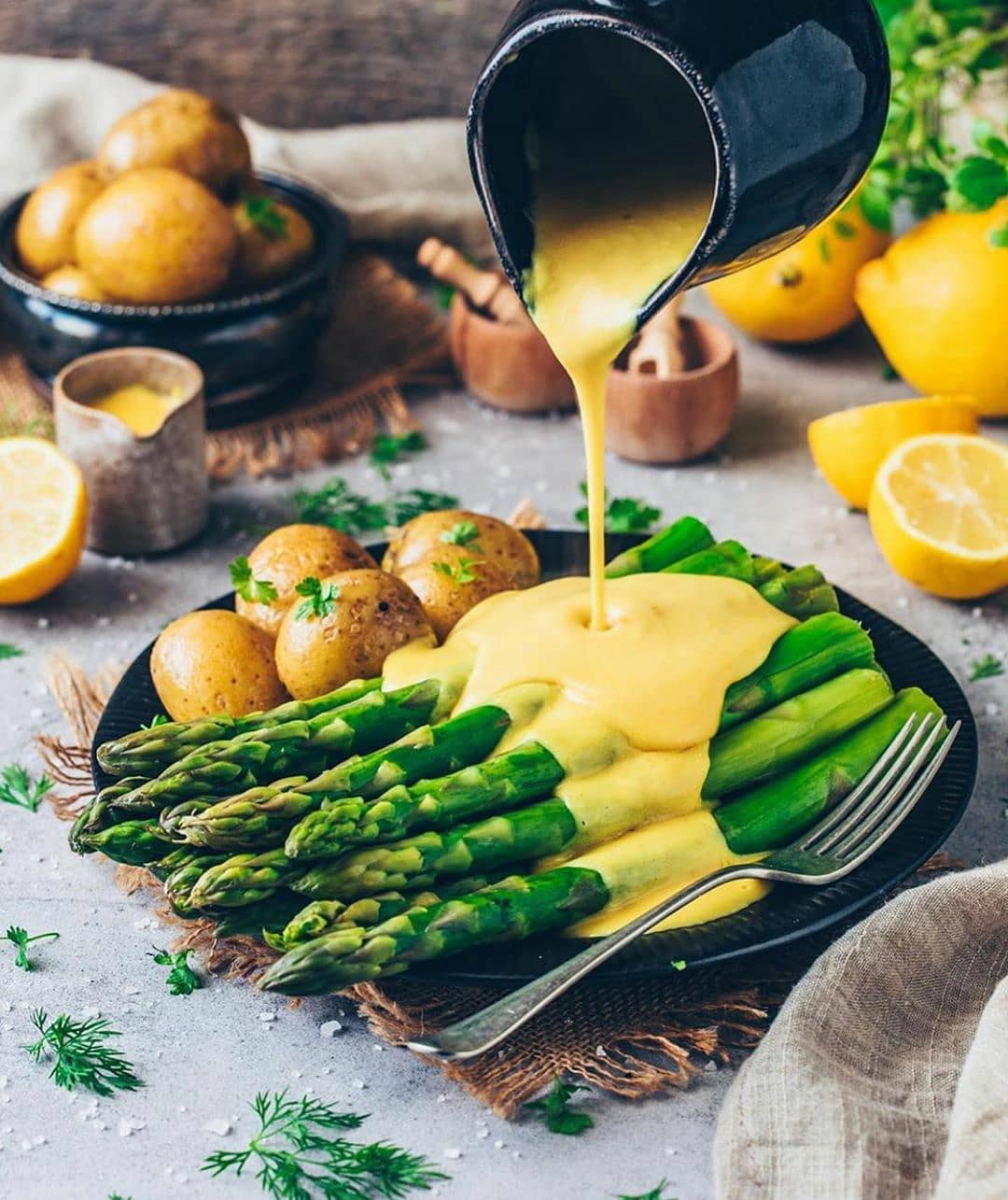 Vegan Hollandaise Sauce Served with Asparagus