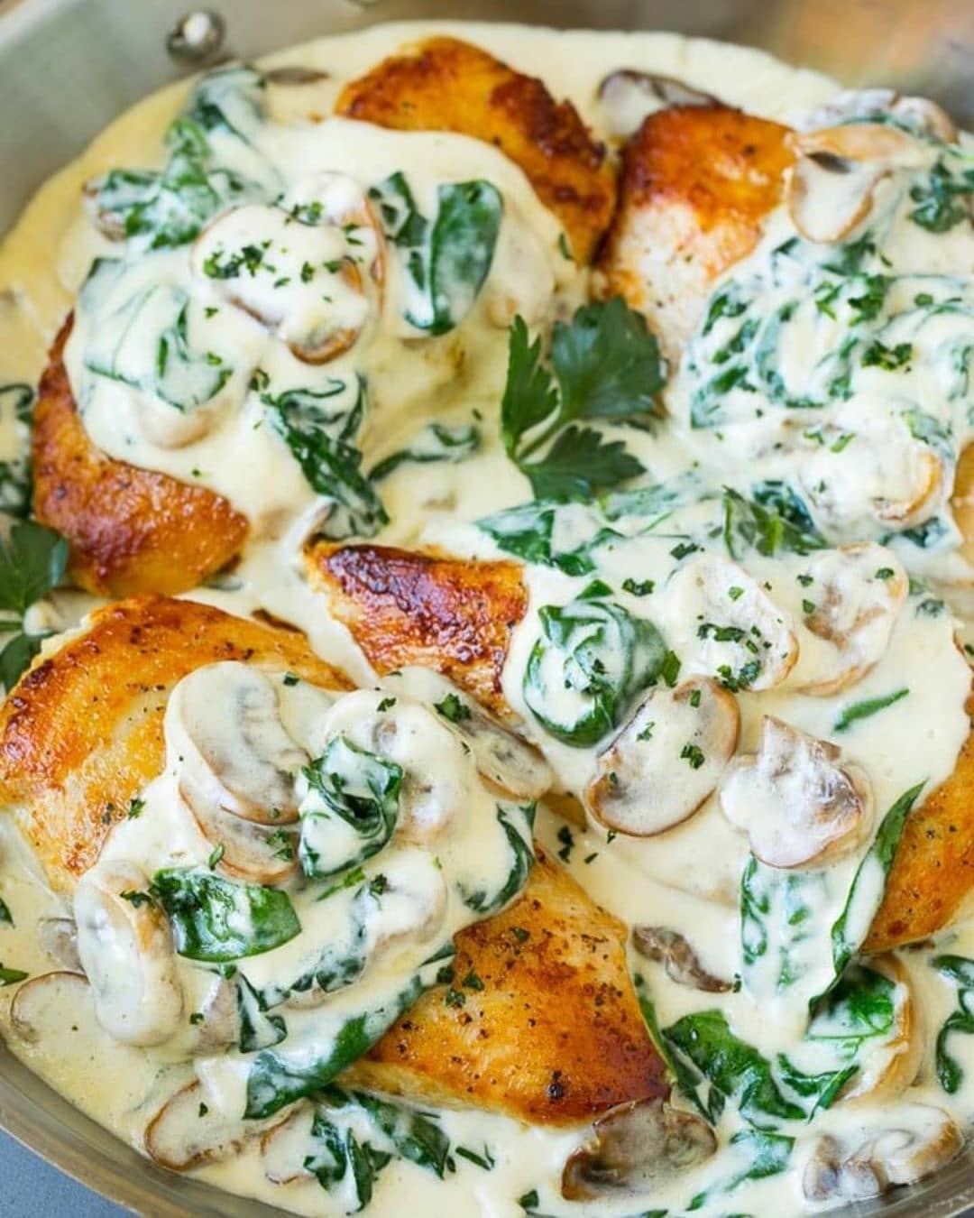 Golden Brown Chicken Breasts with Creamy Spinach Sauce