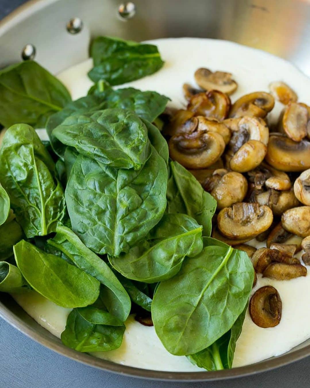 Golden Brown Chicken Breasts with Creamy Spinach Sauce