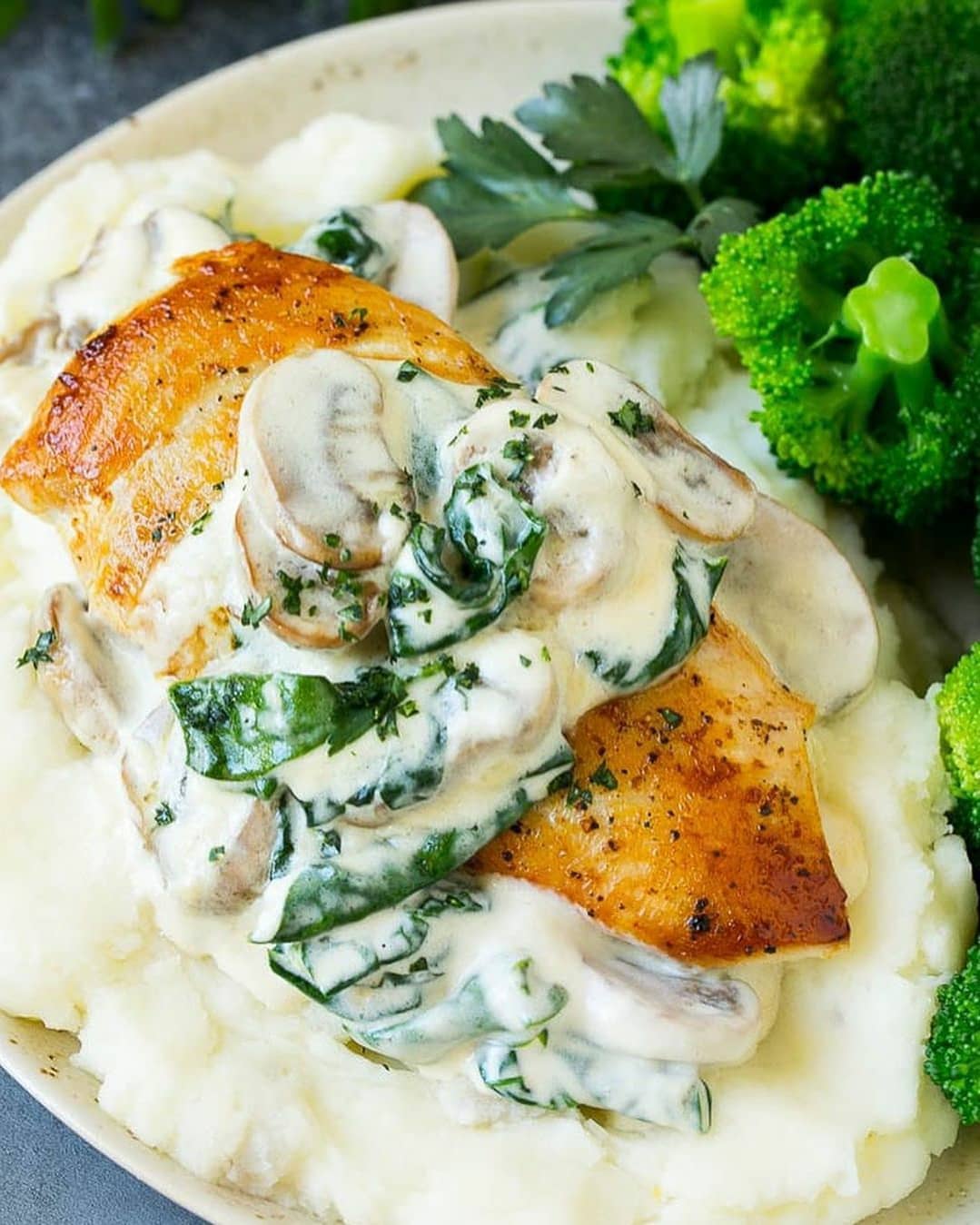 Golden Brown Chicken Breasts with Creamy Spinach Sauce