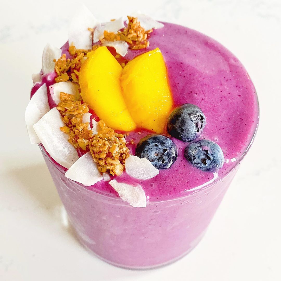 Invigorating Purple Pitaya Smoothie with Tropical Toppings