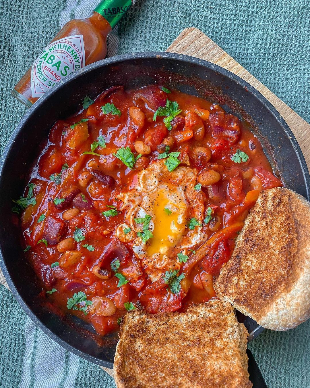 Shakshuka with Peppers Onions Beans and Eggs