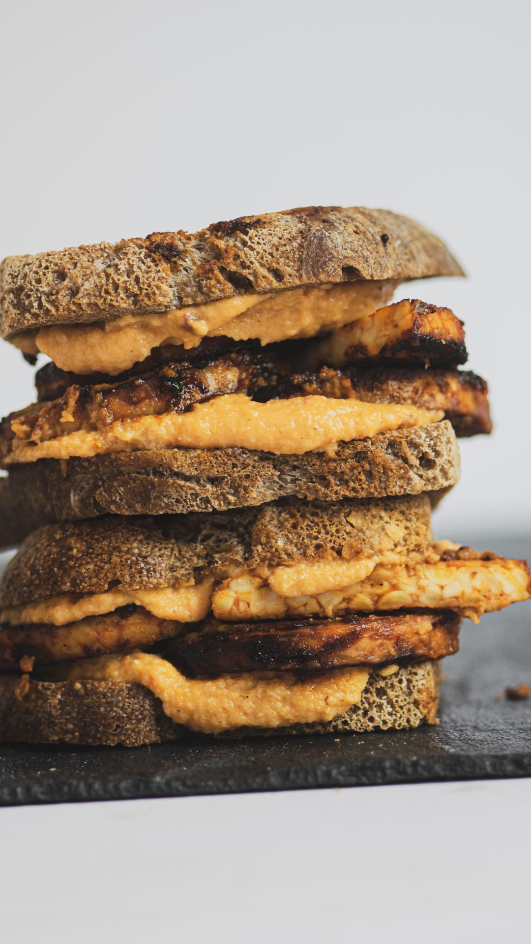 Toasted Sourdough Sandwich with Smoky Tempeh and Spicy Chipotle White Bean Hummus