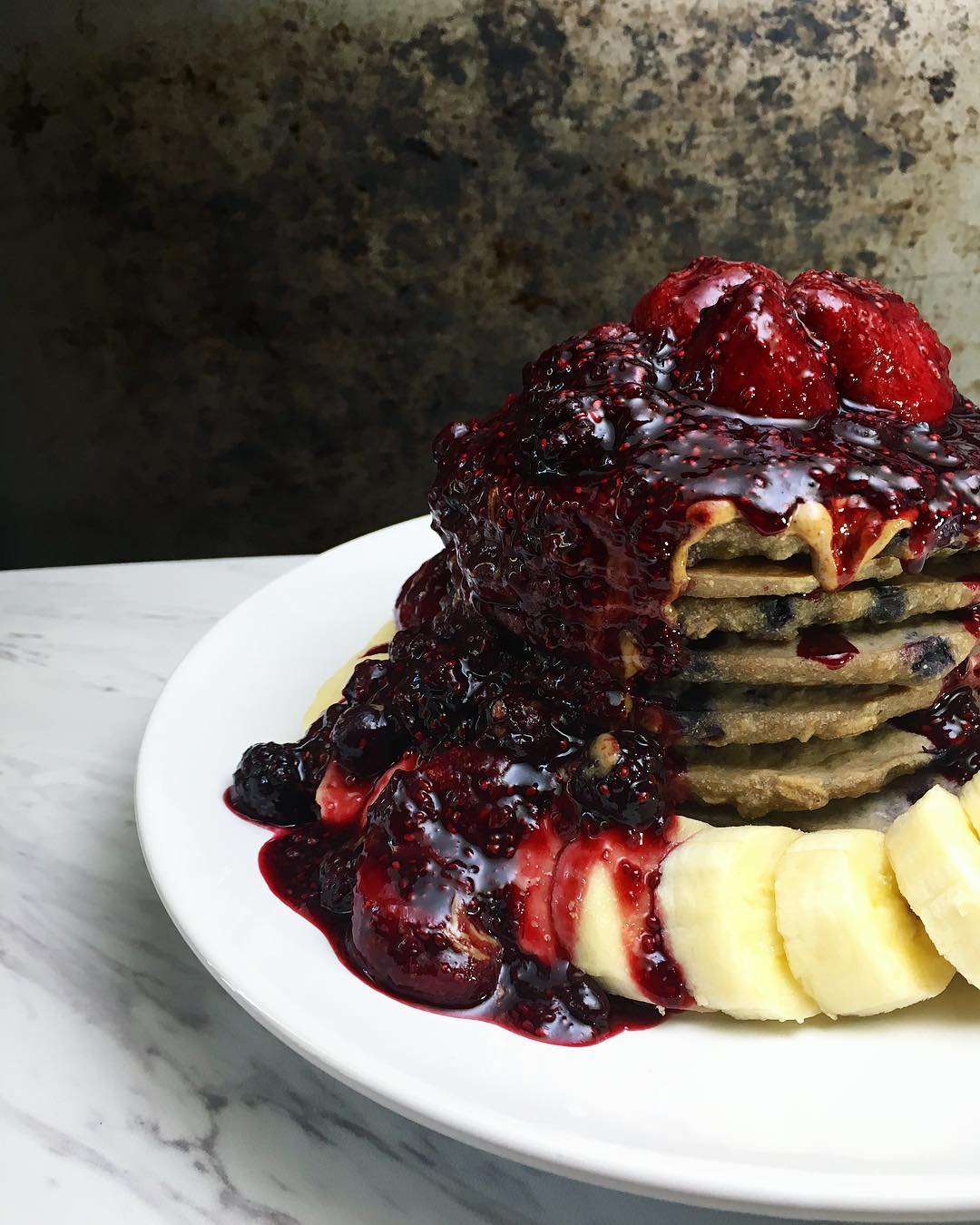 Whole Grain Oat Pancakes with Banana and Berries