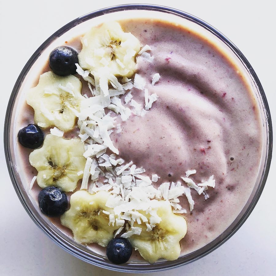 Pink Smoothie Bowl with Fresh Fruits and Toppings
