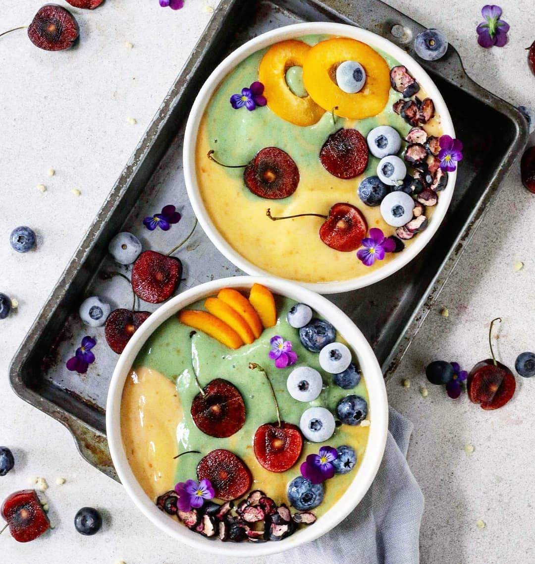 Frozen Fruit Smoothie Bowl with Yellow and Green Layers