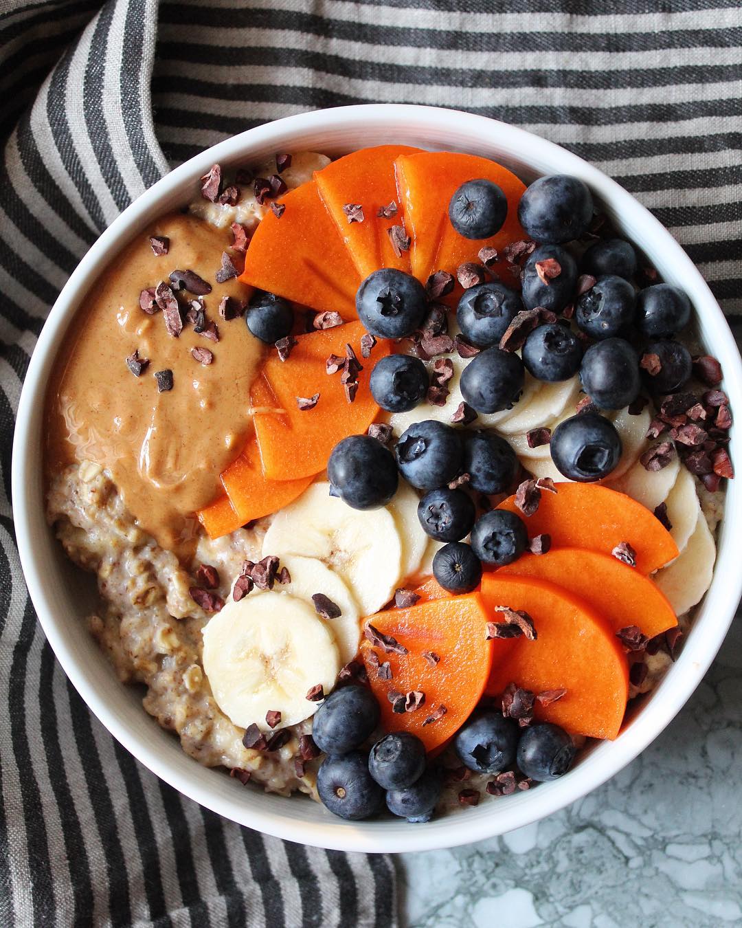 Ginger Oatmeal with Fresh Fruits and Toppings