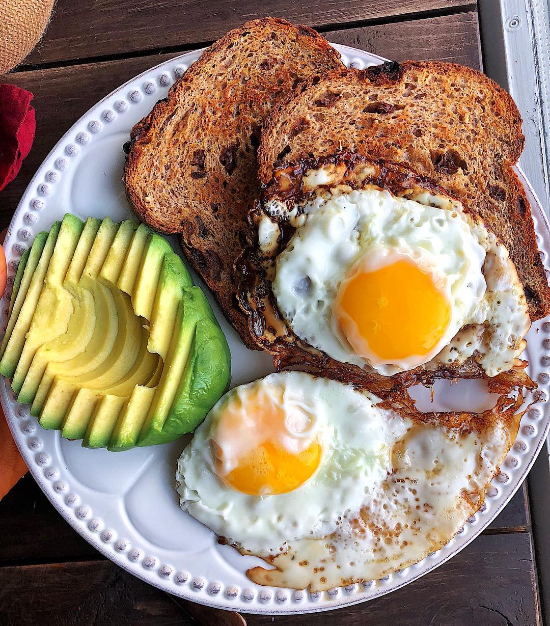 Cinnamon Raisin Toast with Avocado and Eggs