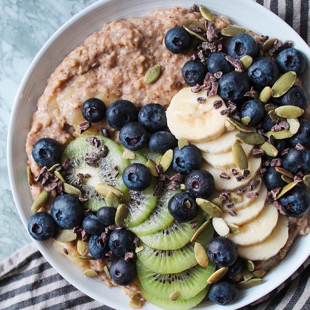 Maca Oatmeal Breakfast with Almond Milk and Toppings