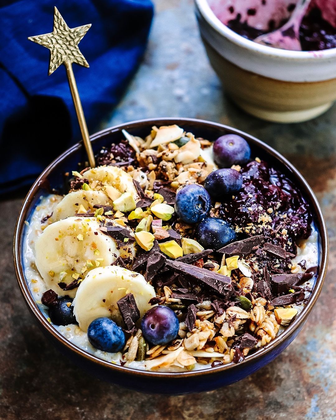 Hot Coconut Oat Porridge with Berries and Nuts