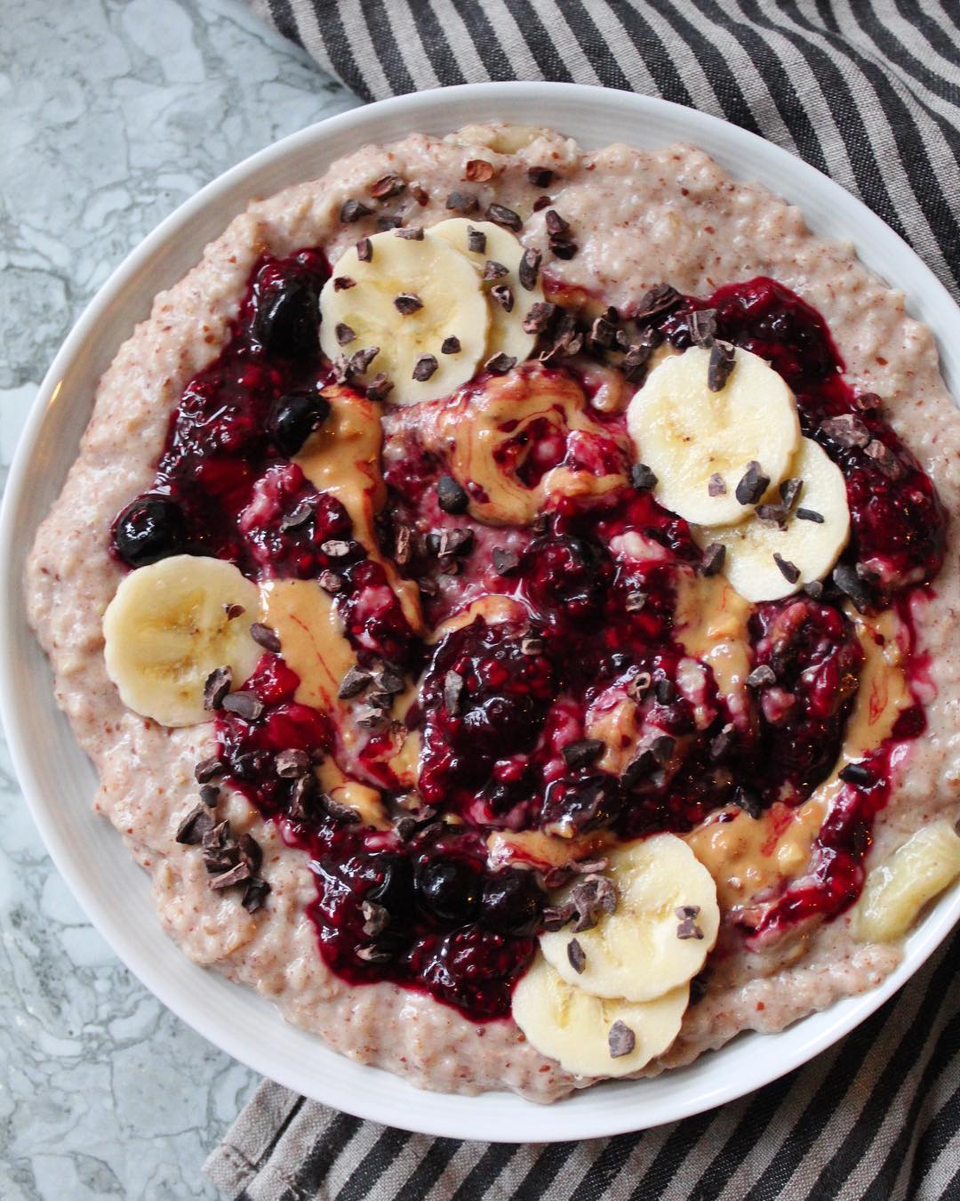 Cozy Peanut Butter and Jelly Oatmeal Bowl