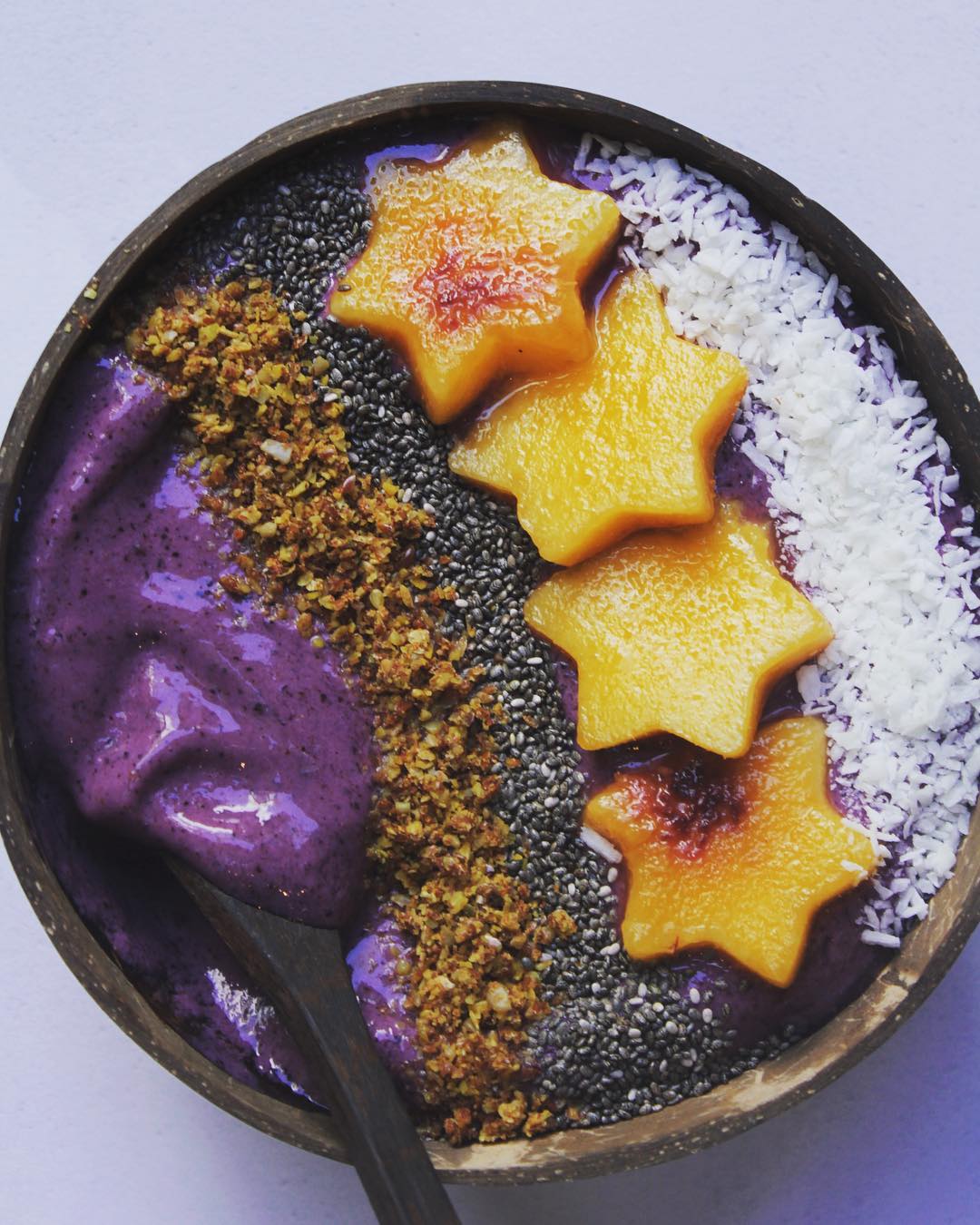 Vibrant Purple Smoothie Bowl with Tropical Fruits