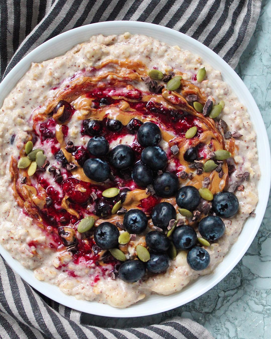 Creamy Oatmeal with Homemade Berry Jam and Blueberries