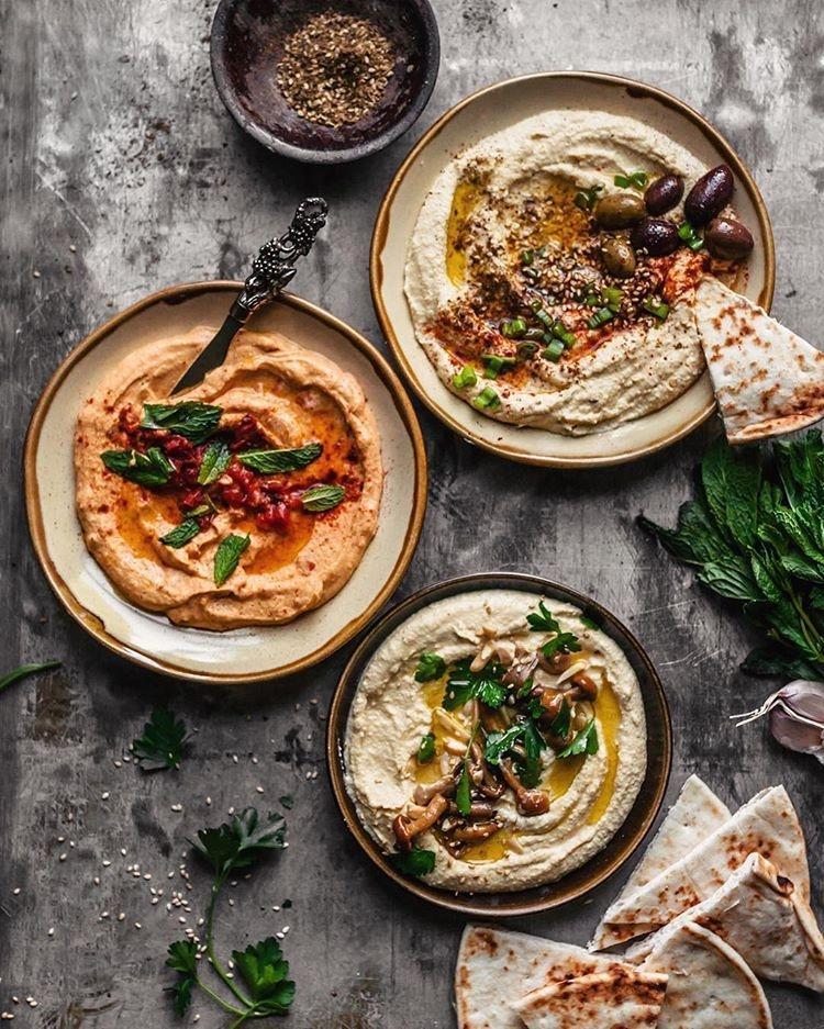 Homemade Hummus with Various Toppings and Variations