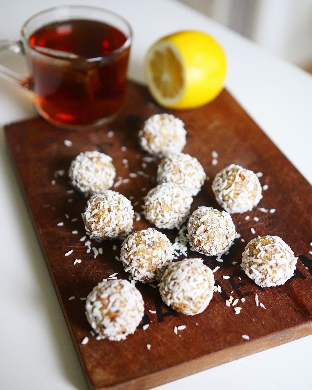 Vegan Lemon Bliss Balls with Coconut Garnish