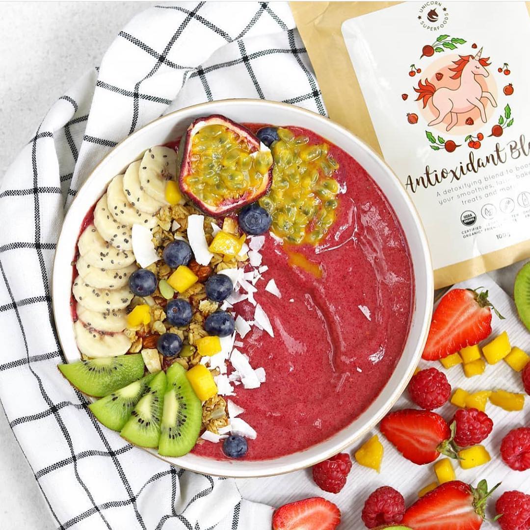 Bright Red Smoothie Bowl with Delicious Fruits