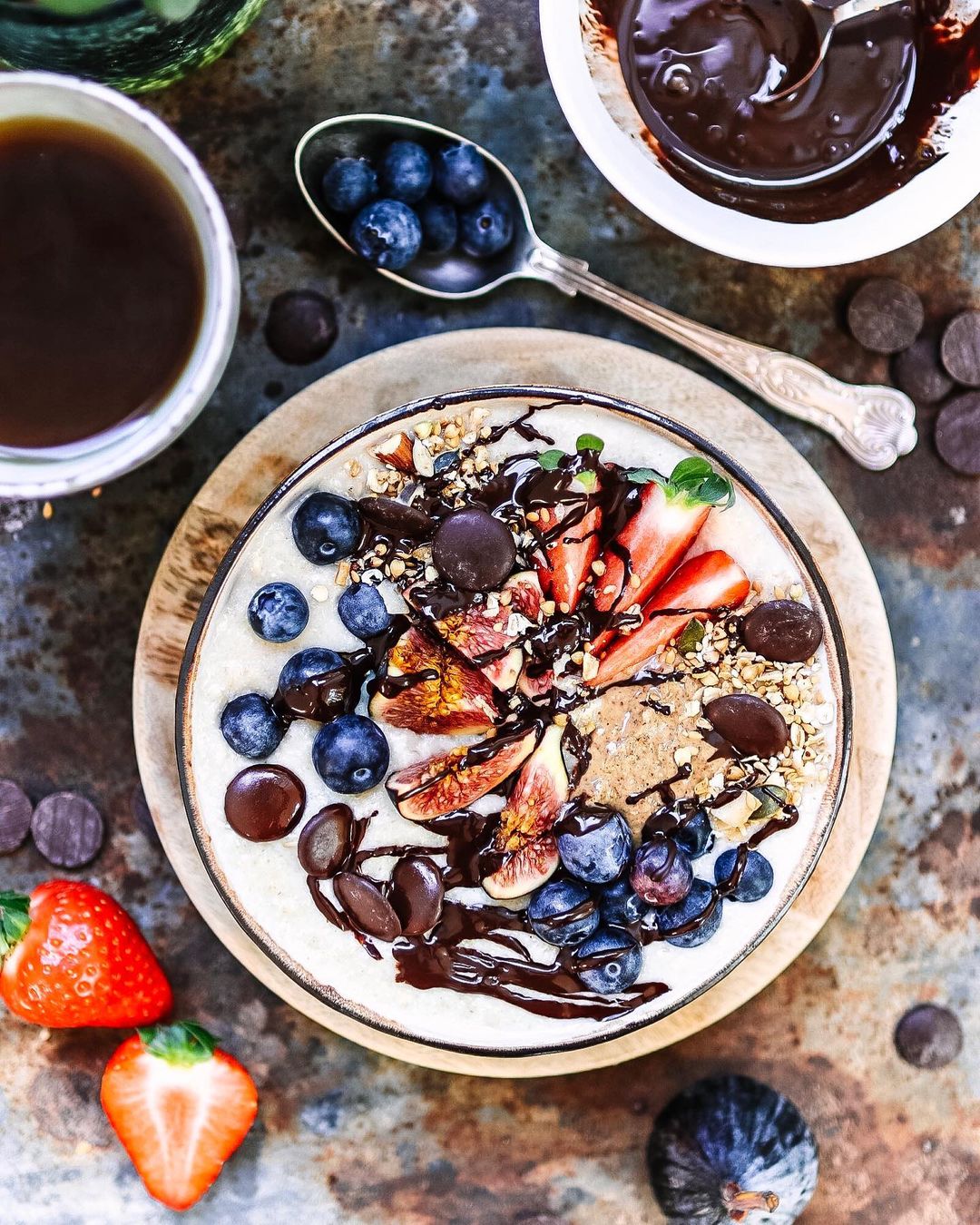 Quinoa and Oat Coconut Porridge with Hot Blueberries
