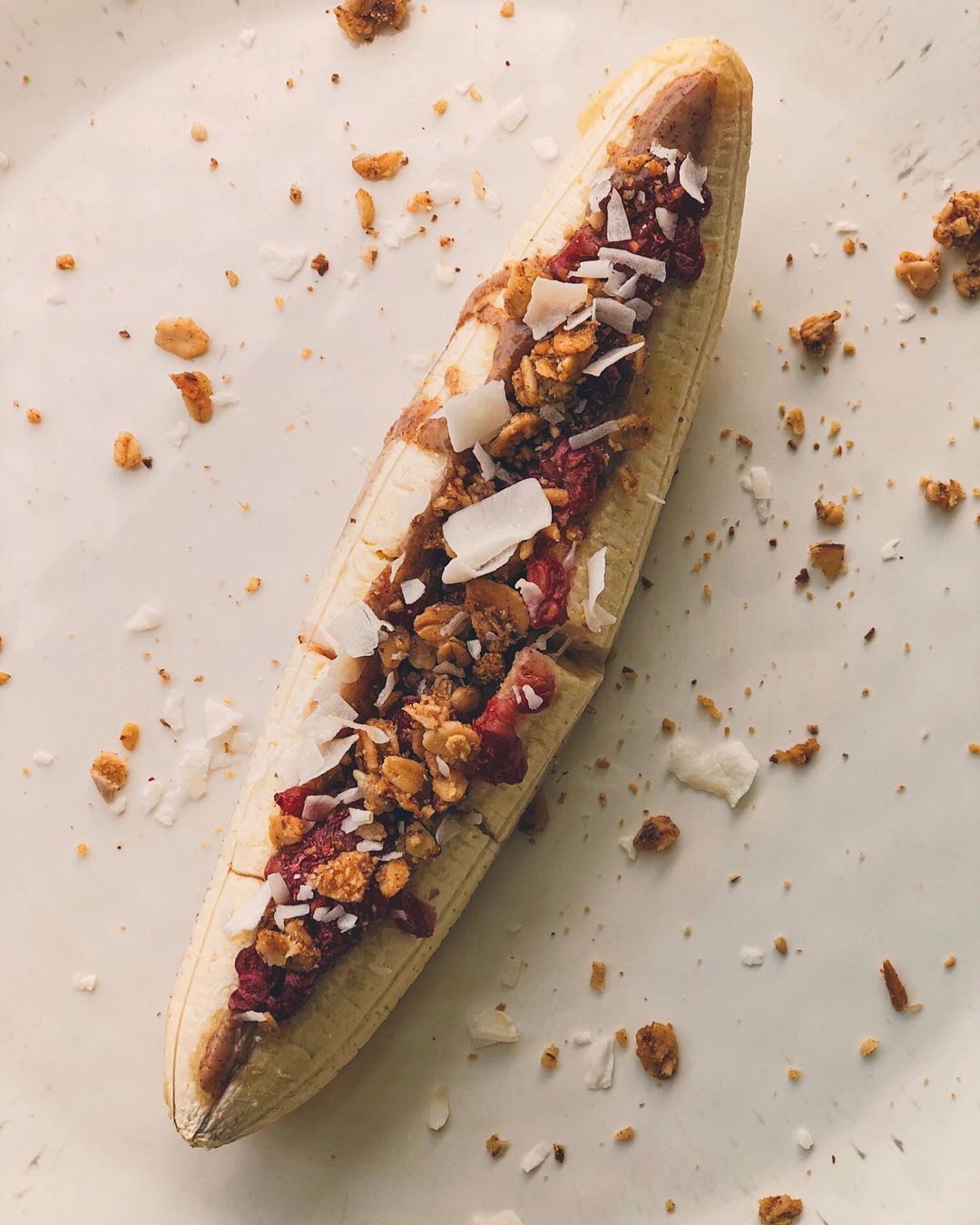 Stuffed Banana Breakfast with Almond Butter and Raspberries