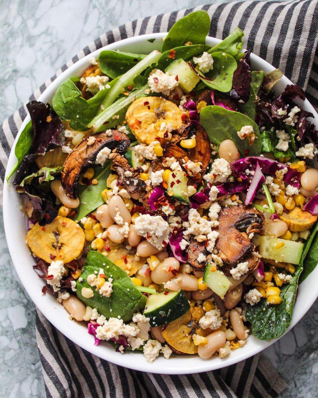 Vegan Plantain Salad with Tofu Feta and Garlic Beans