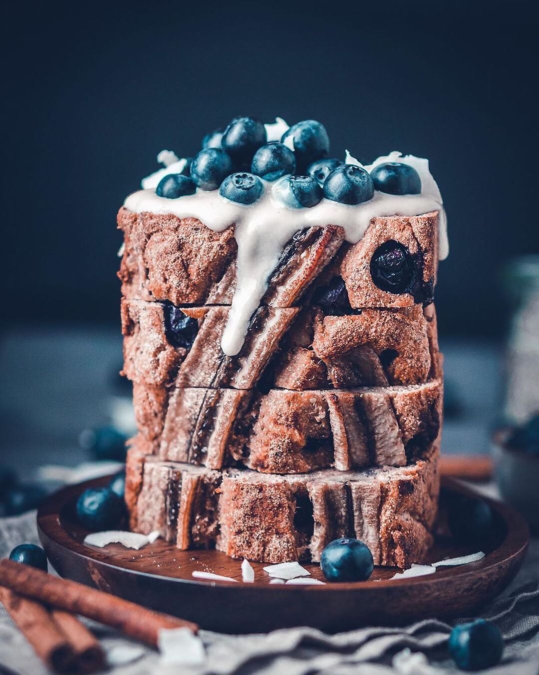 Banana Bread Topped with Almond Yogurt, Blueberries & Coconut Rasps