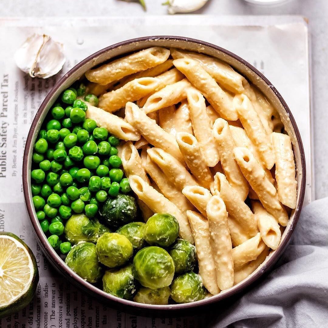 Creamy Hummus Pasta with Peas and Brussels Sprouts