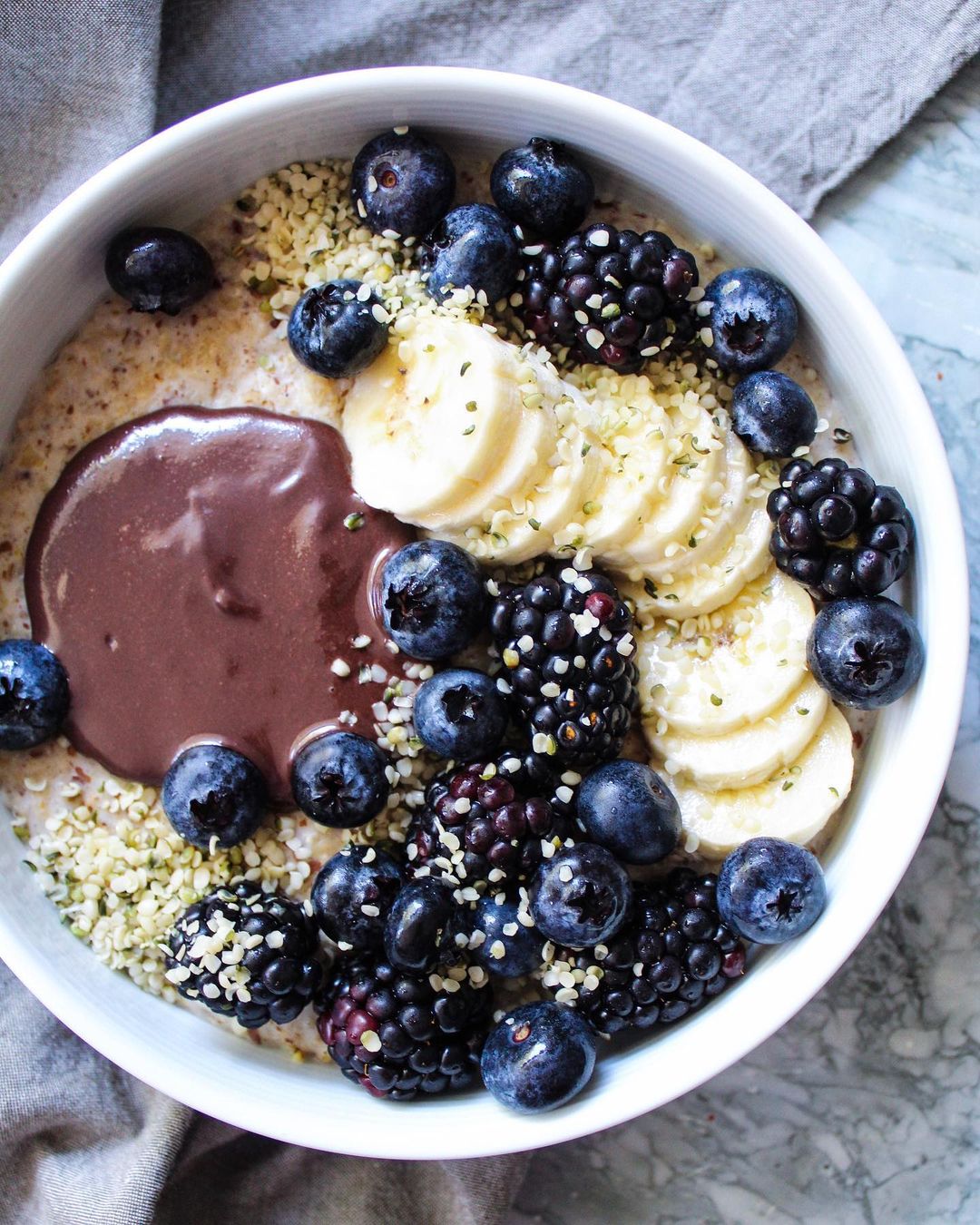 Ginger Infused Oats with Chocolate Tahini Topping