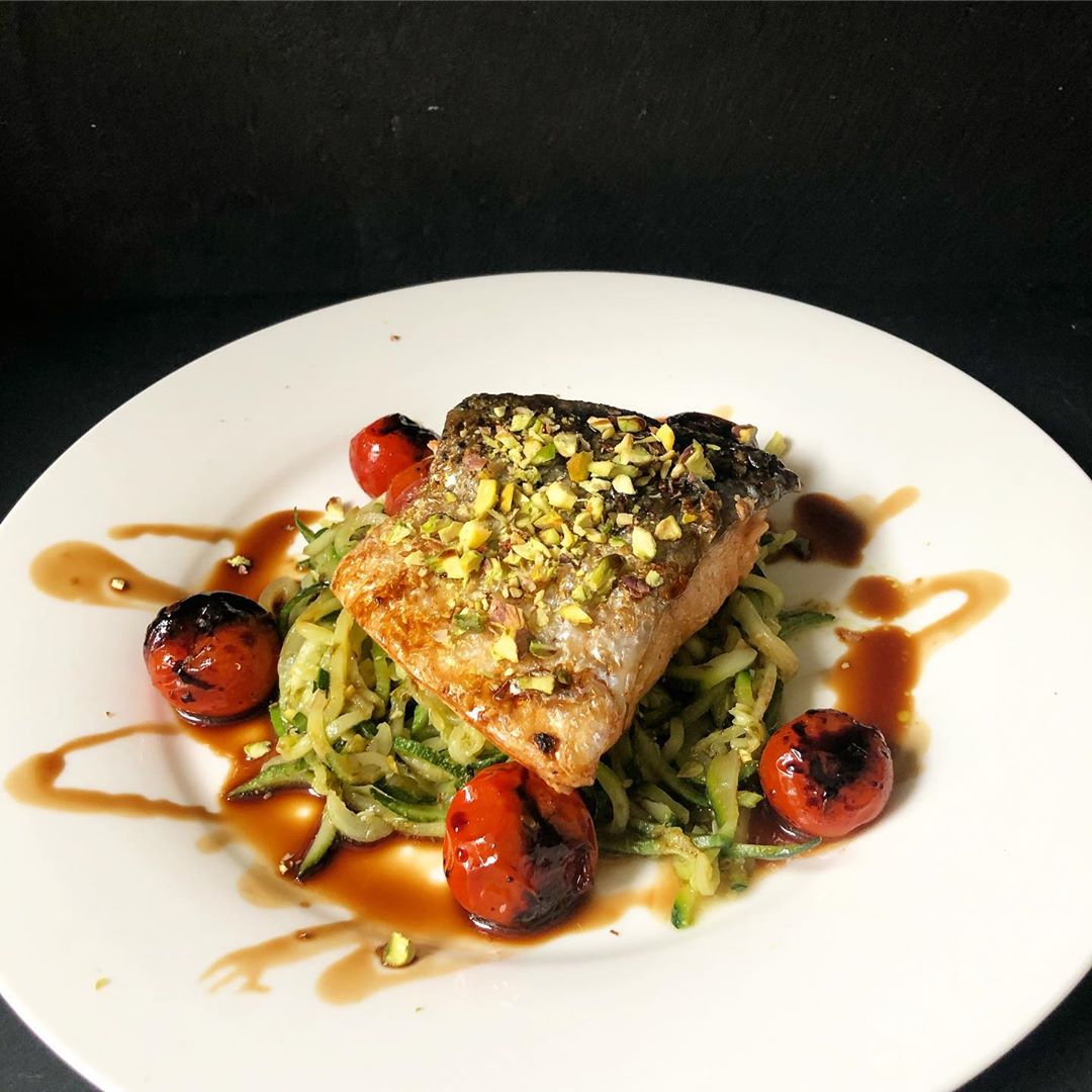 Salmon with Pistachio Pesto, Courgetti, and Balsamic Tomatoes