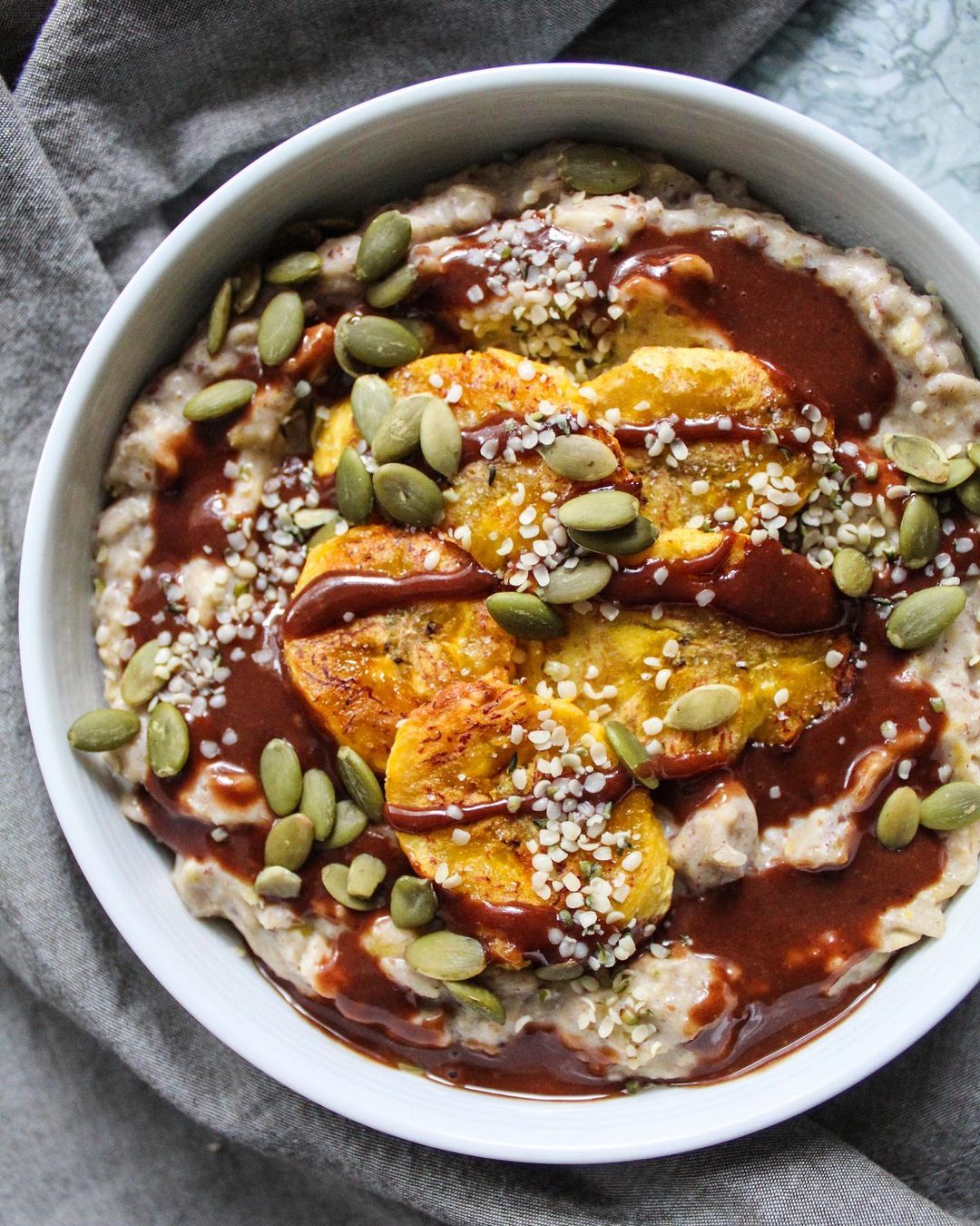 Ripe Plantain Oatmeal with Tahini Chocolate Sauce