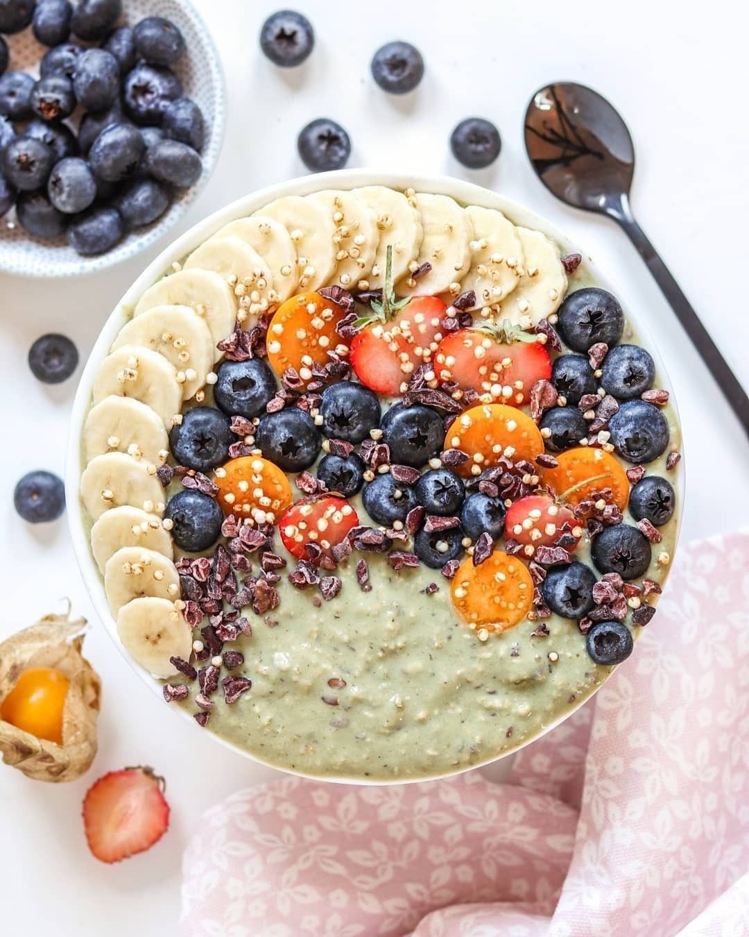 Creamy Matcha Oatmeal with Fruit and Cacao Nibs