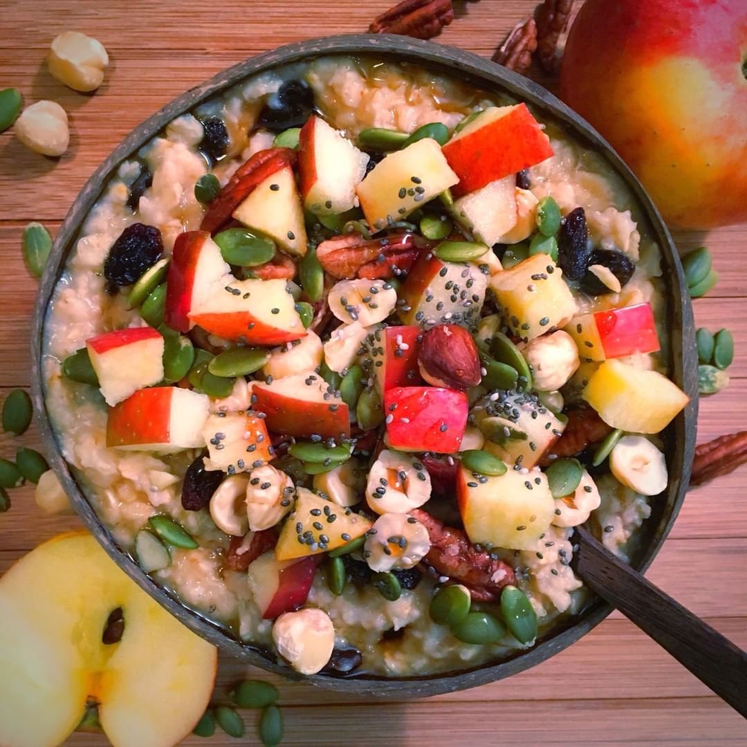 Warm Nutty Oatmeal with Raisins and Apple