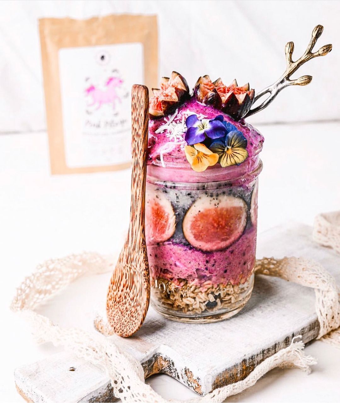 Pink Pitaya Smoothie Layered with Granola and Figs