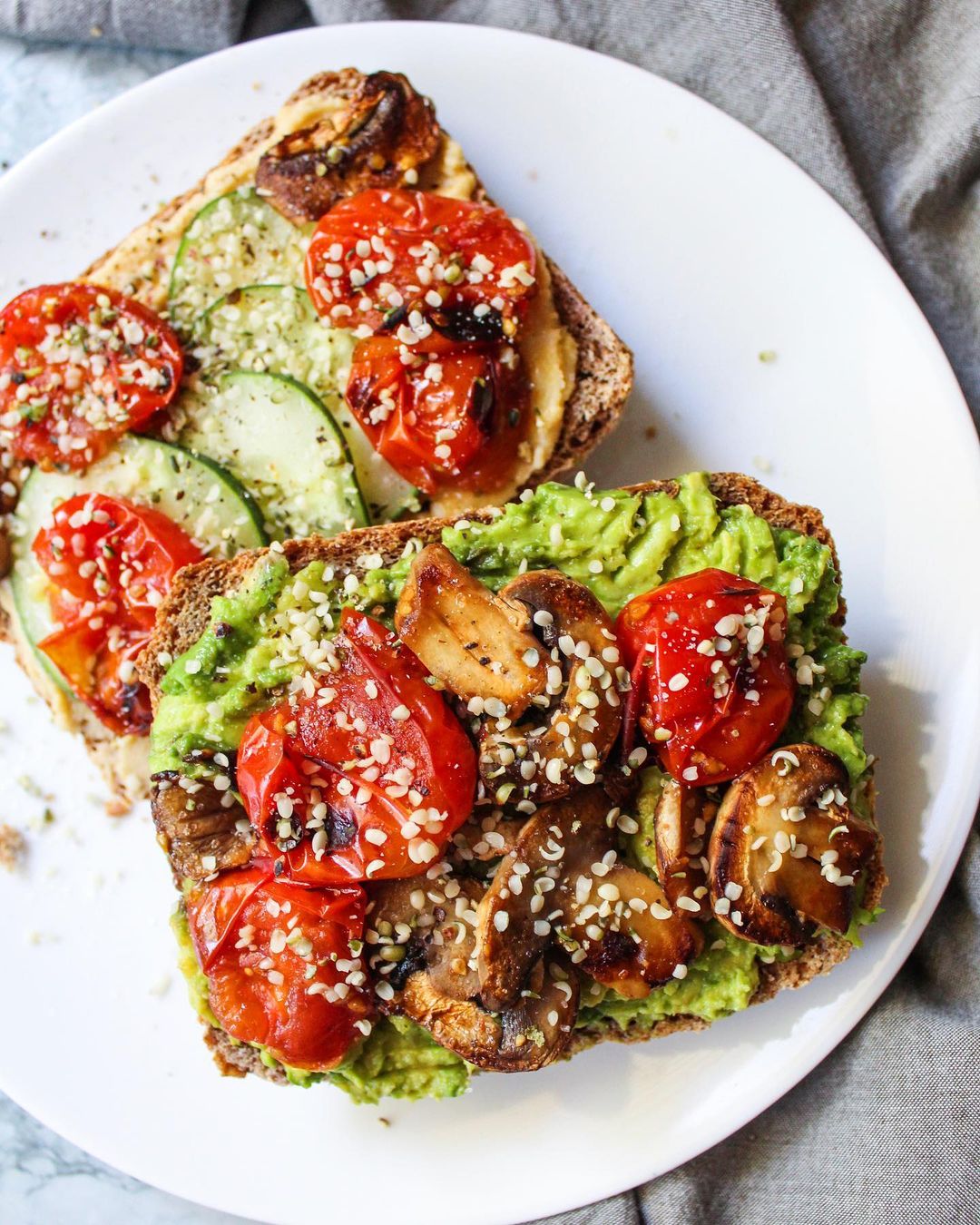 Spelt Toast with Avocado Hummus and Sautéed Tomatoes