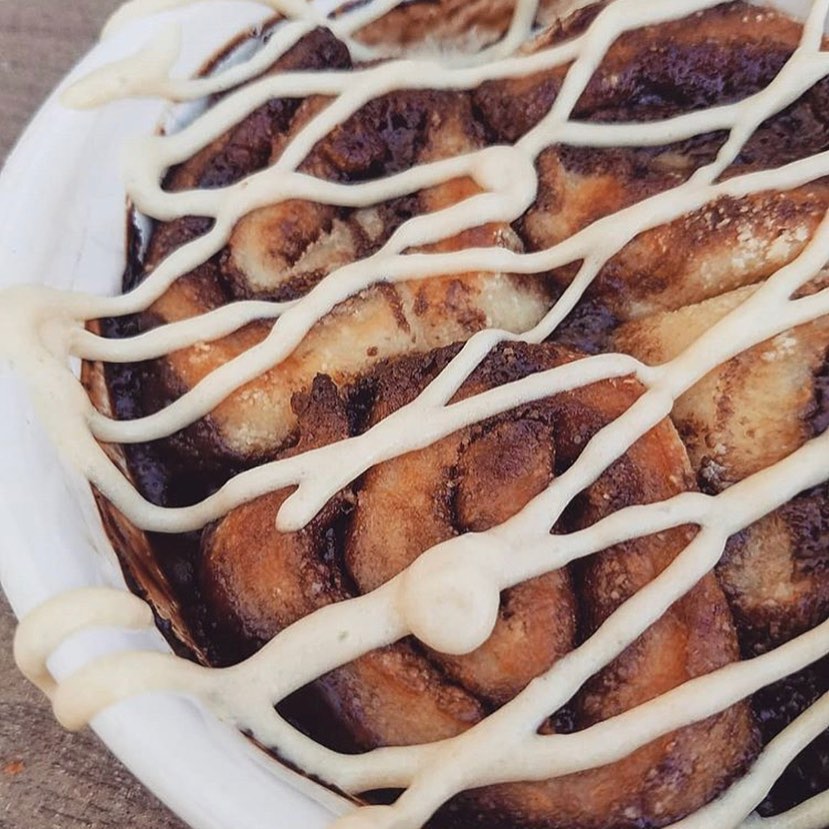 Puppy Chow Sweet Rolls with a Vanilla Cream Glaze