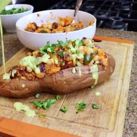 Stuffed Sweet Potatoes with Veggies and Avocado Sauce
