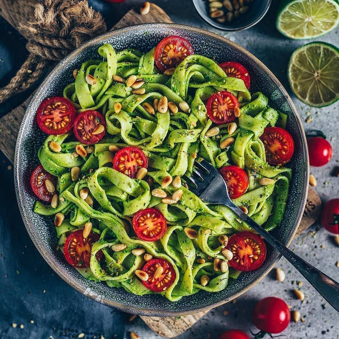 Creamy Spinach Pasta with Fresh Tomatoes and Roasted Pine Nuts