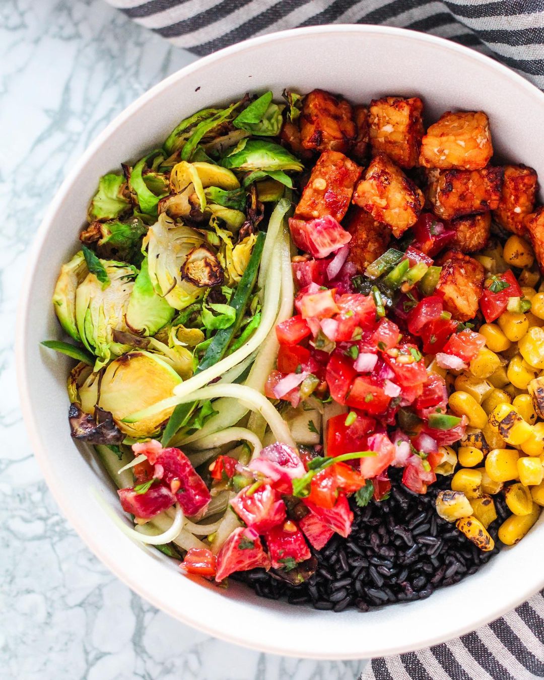 Gochujang Tempeh, Blood Orange Salsa, Fire Roasted Corn, Shaved Brussel Sprouts and Shredded Cucumber with My Fav Rice