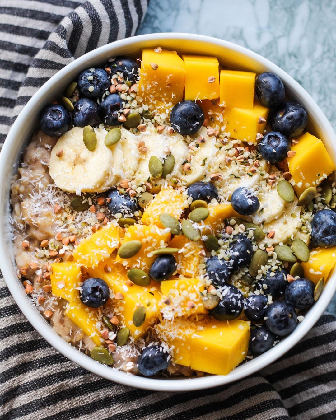 Simple Oatmeal Breakfast with Fresh Mango Toppings