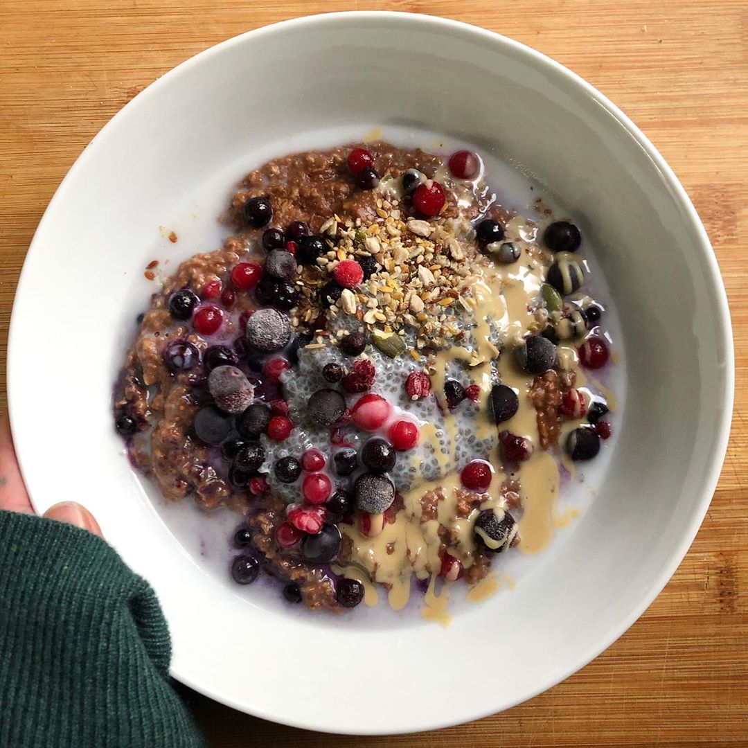 Chocolate Oatmeal Breakfast with Berry Toppings