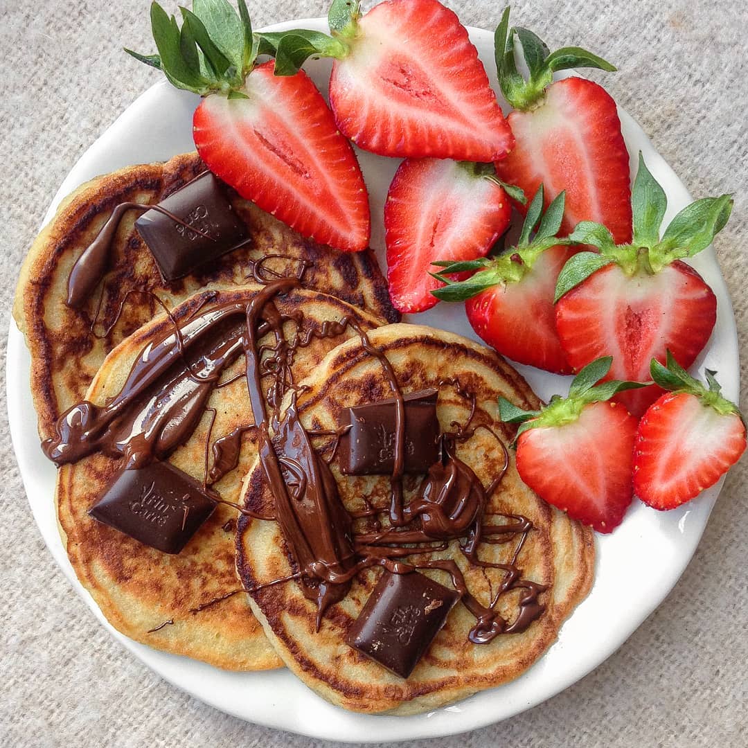 Banana Bread Pancakes with Chocolate and Strawberries