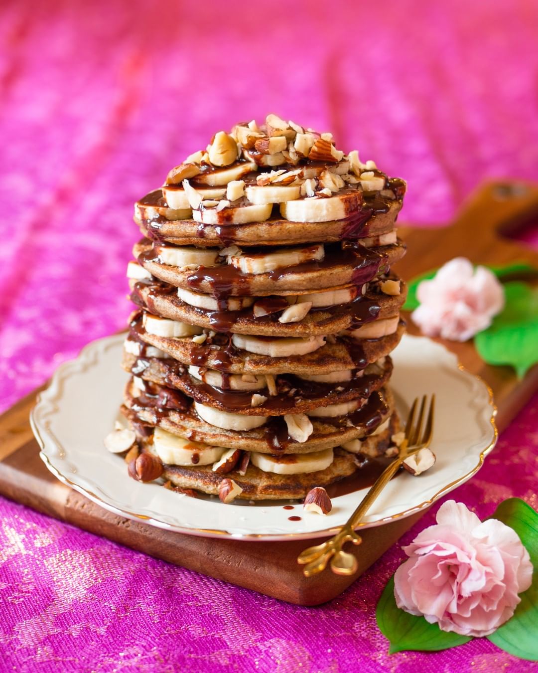 Fluffy Banana Pancakes with Hazelnuts and Chocolate Sauce