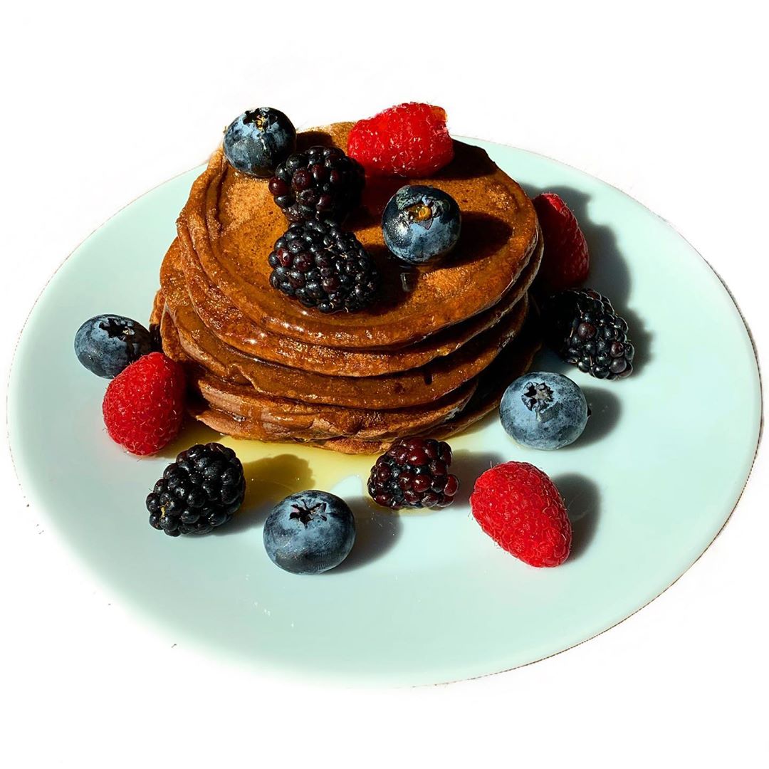 Cacao Protein Pancakes with Maple Syrup and Berries