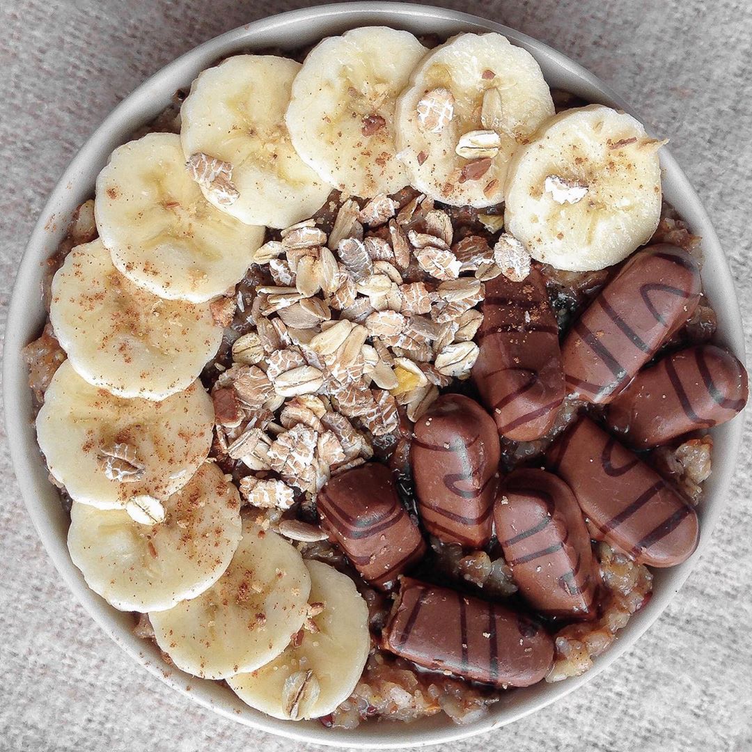 Banana Oatmeal Bowl with Chocolate Cookies and Cinnamon